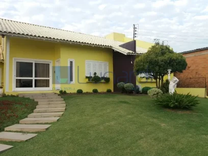 Foto Casa com 4 Dormitórios