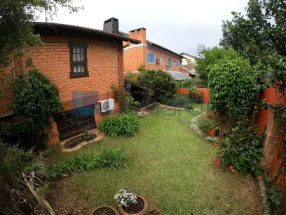 Foto Casa com 3 Dormitórios