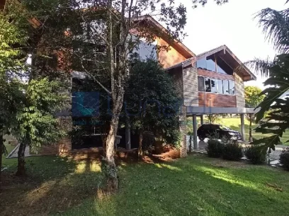 Foto Casa com 4 Dormitórios