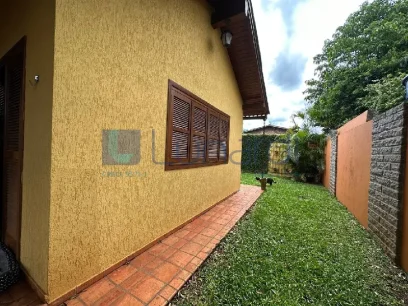 Foto Casa com 3 Dormitórios