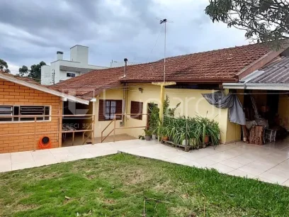 Foto Casa com 4 Dormitórios