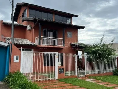 Foto Casa com 4 Dormitórios