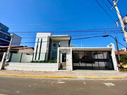 Foto Casa com 4 Dormitórios